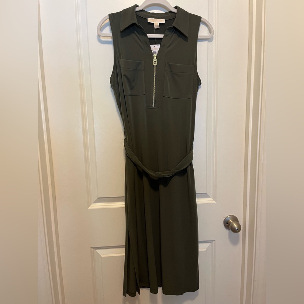New Michael Kors dress. Green with flattering side slits. Size Med. Never worn